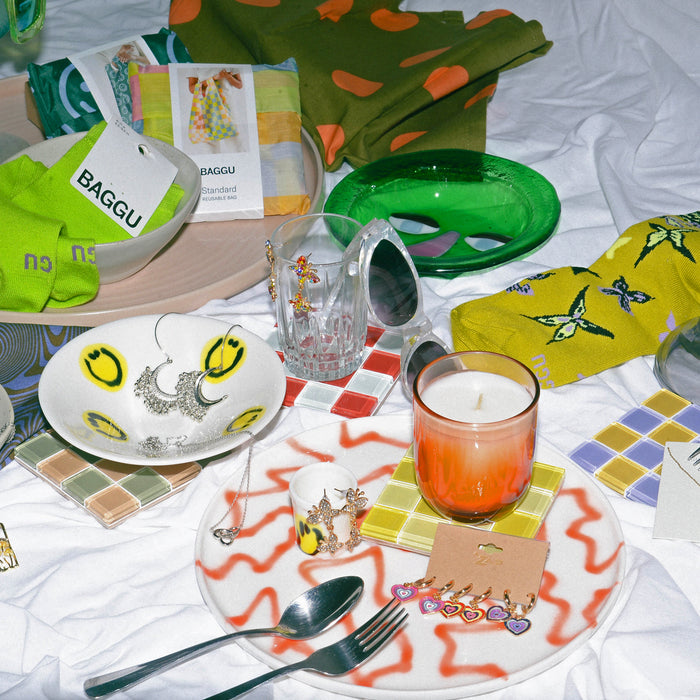 still life of new mearchandise photographed on sheet.