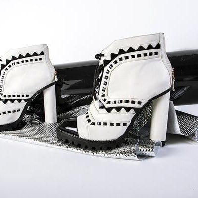 black and white heel boots.