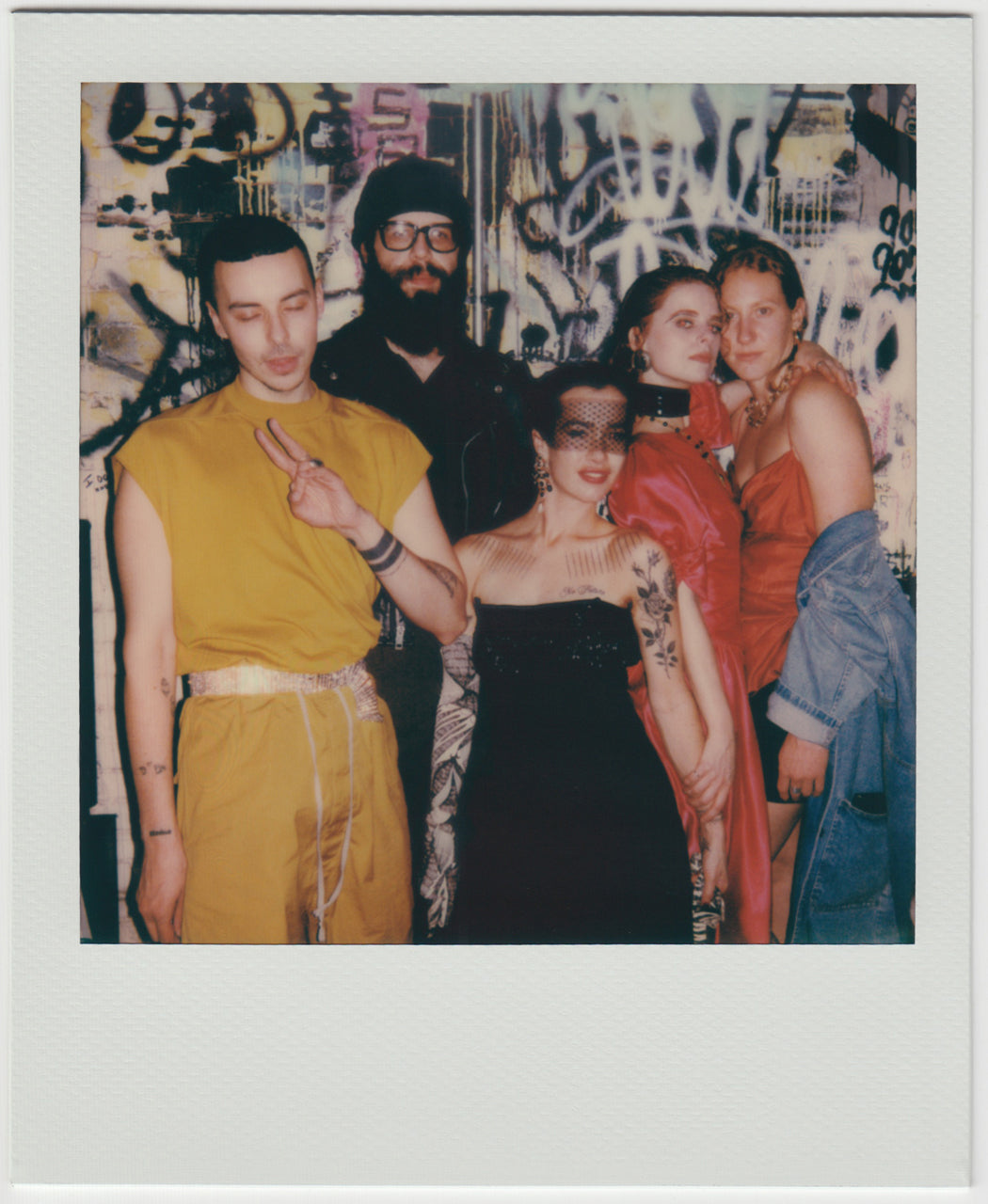 group posing fot the camera - polaroid style.