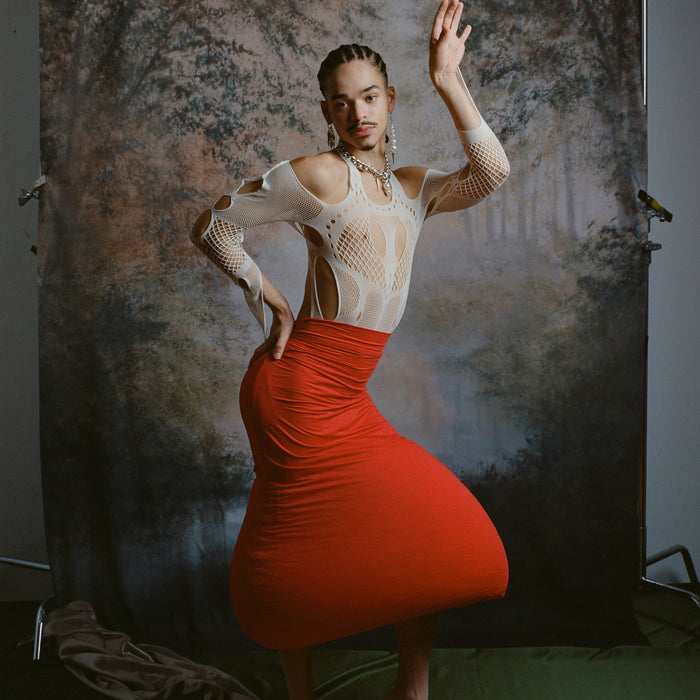 model posing with arm up