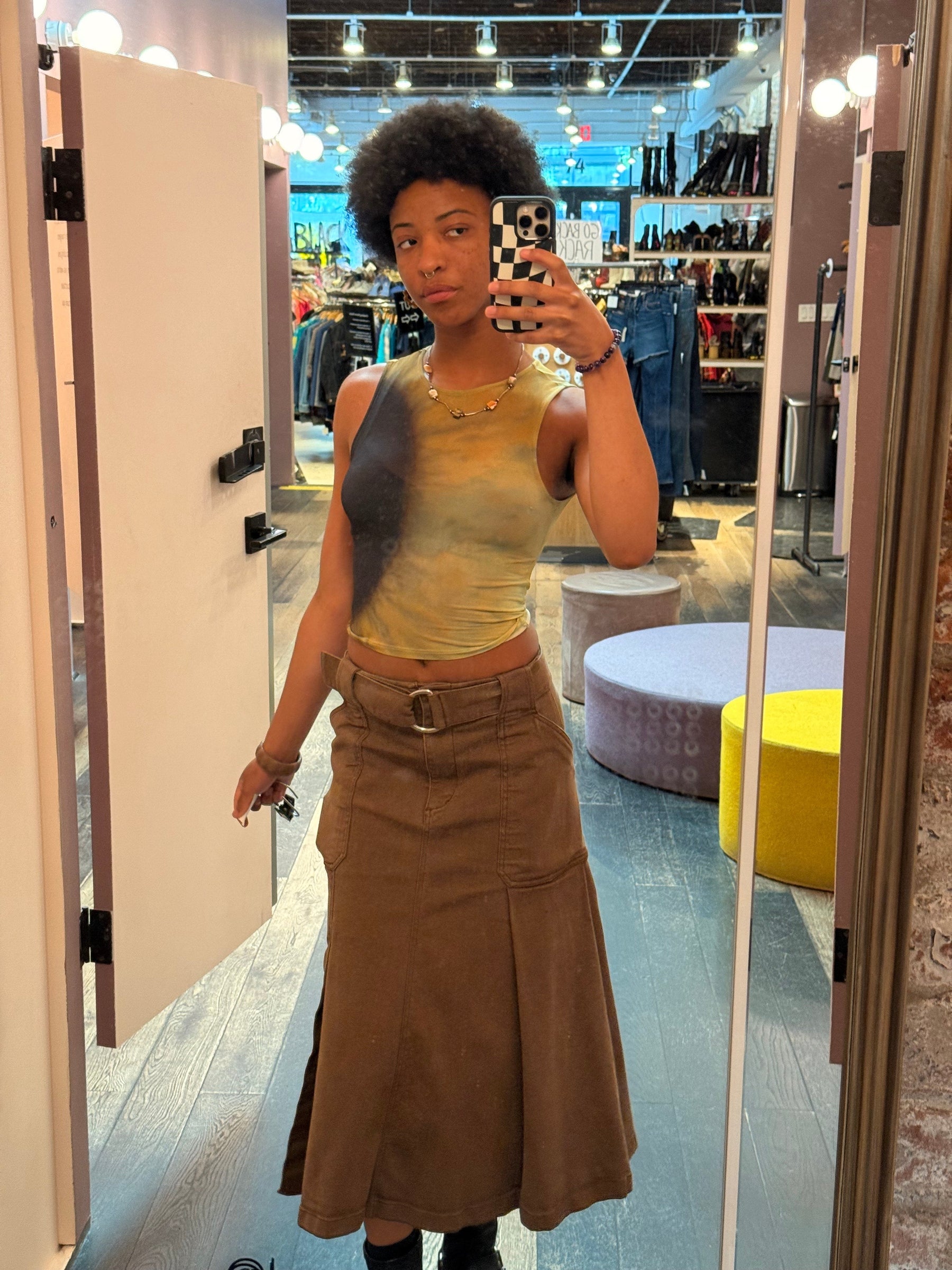 selfie of autumn in greenpoint store mirror