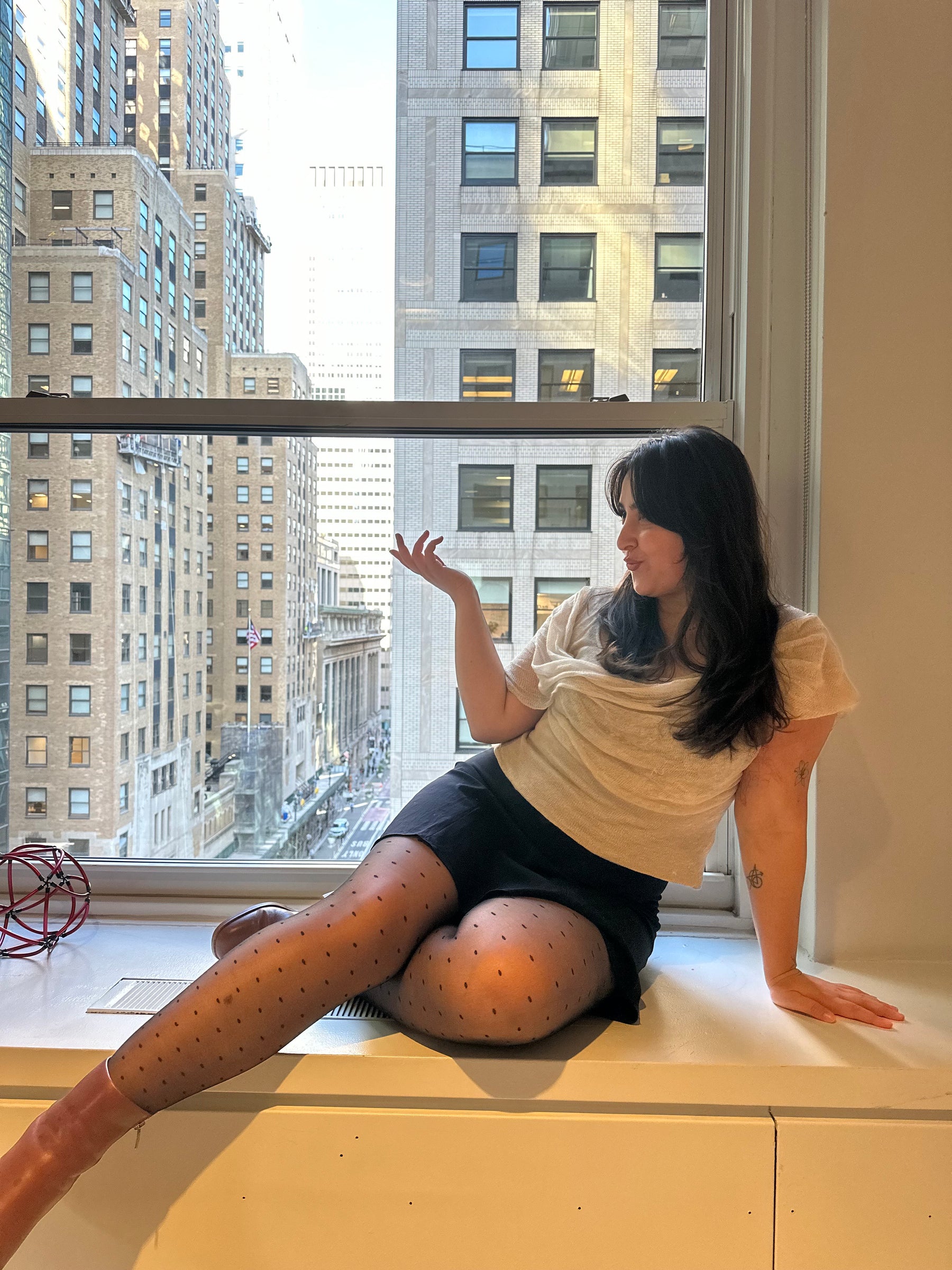 photo of Beyza Uygun posing in window