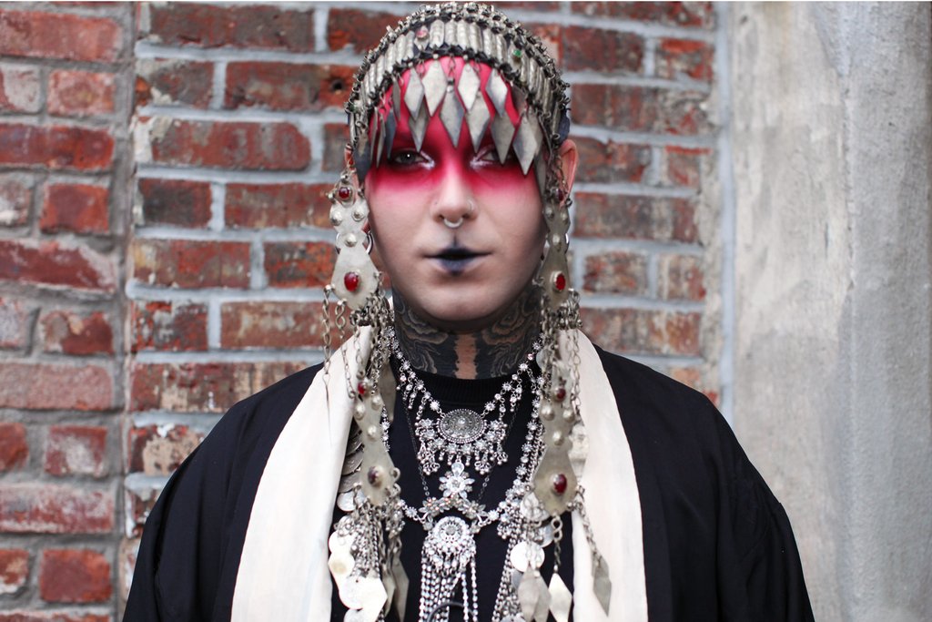 patron in berber headpiece.