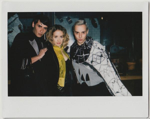 employees posing for the camera.