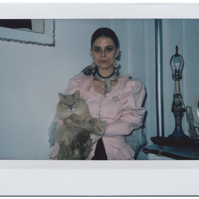 portrait of tatum and their cat.