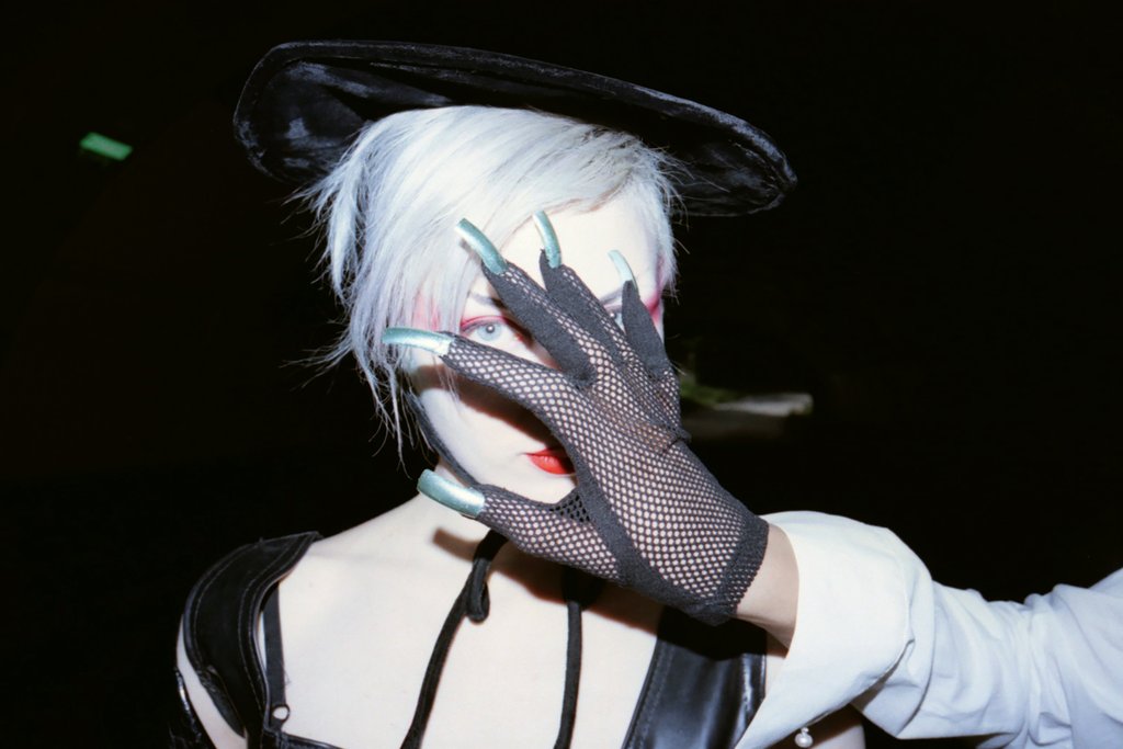 portait with glove and fake nails.