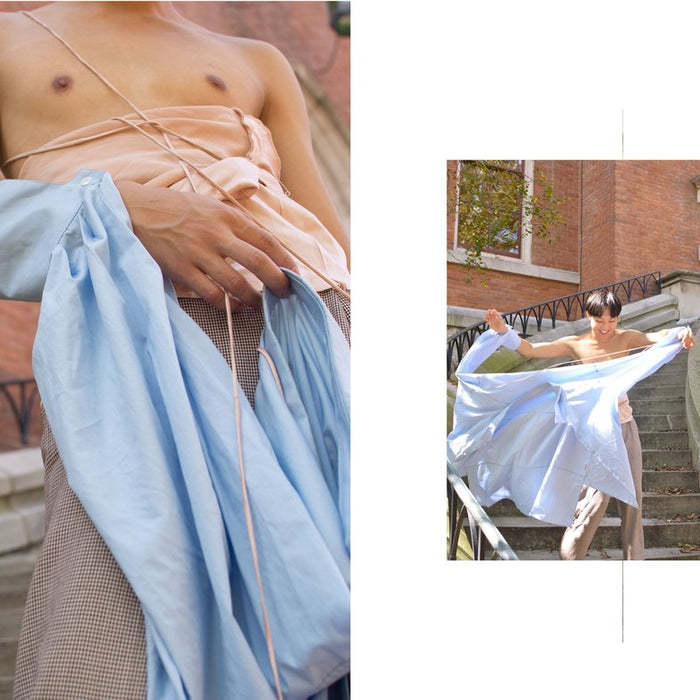 two pictures of a person holding a blue shirt, posing.