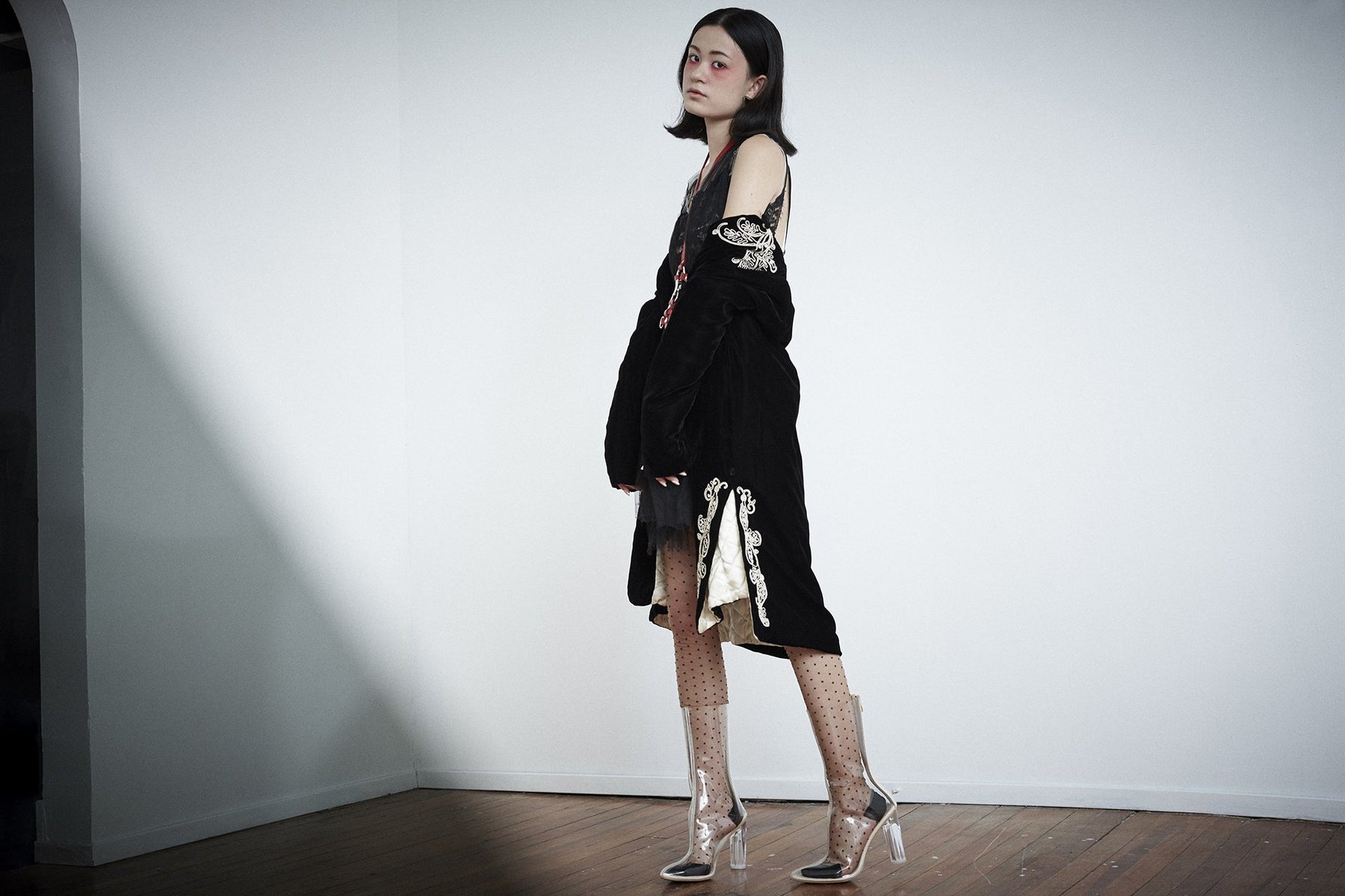 stunning model posing in dressy spellbound look.