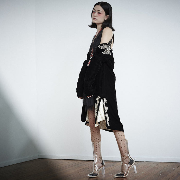 stunning model posing in dressy spellbound look.