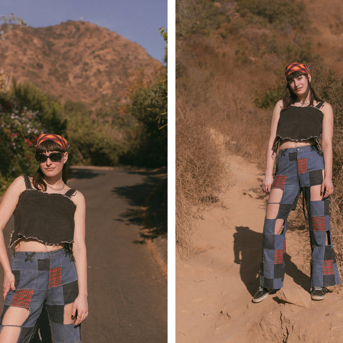 jessi wearing jeans and sunglasses, and full body in a dirt path.