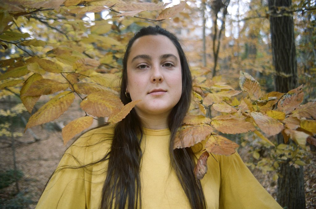 leaf lady in yellow.