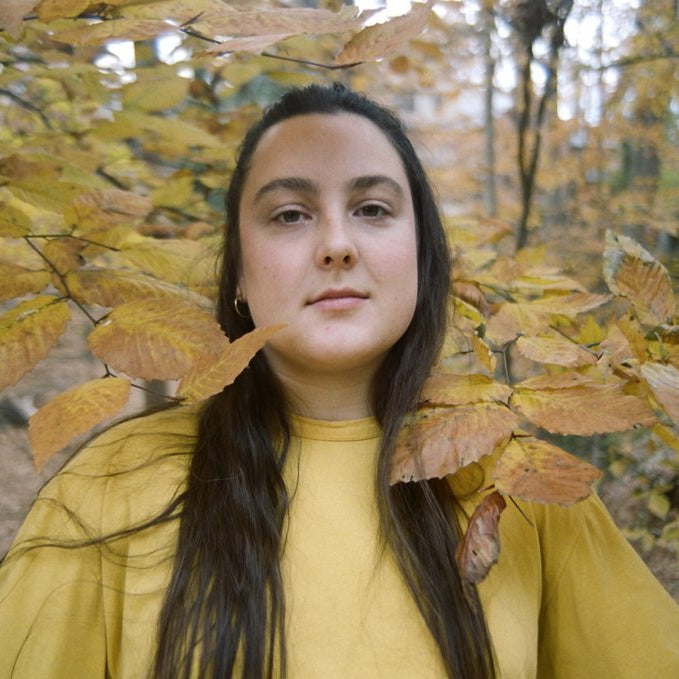 leaf lady in yellow.