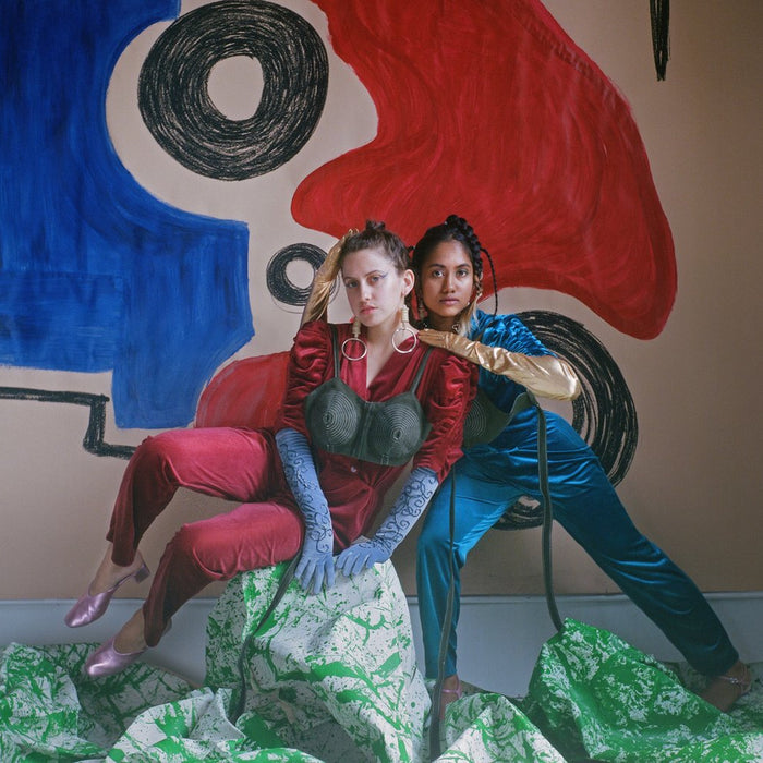 conceptual shoot featuring two models and painted set.