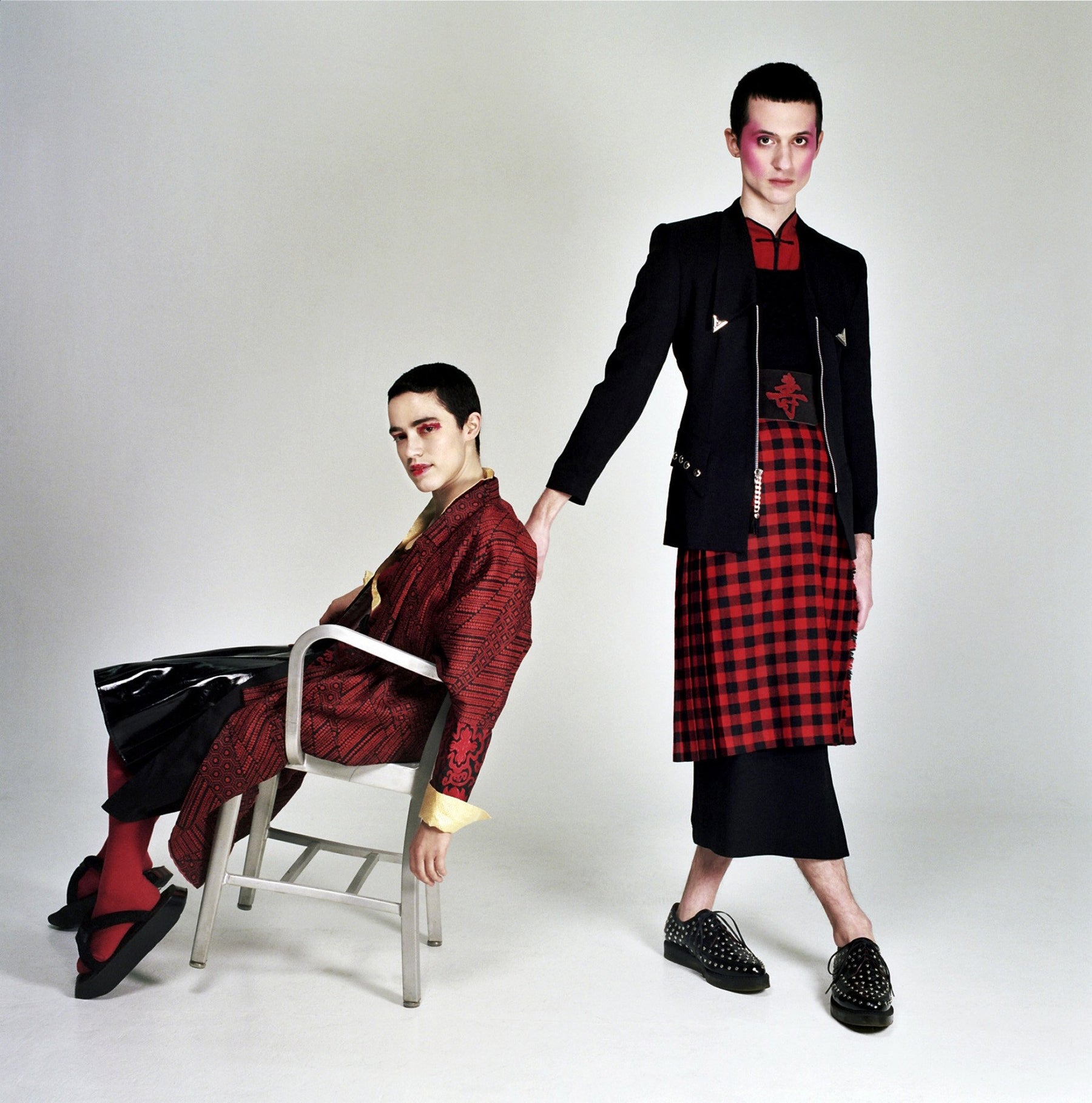 models posing with a chair.