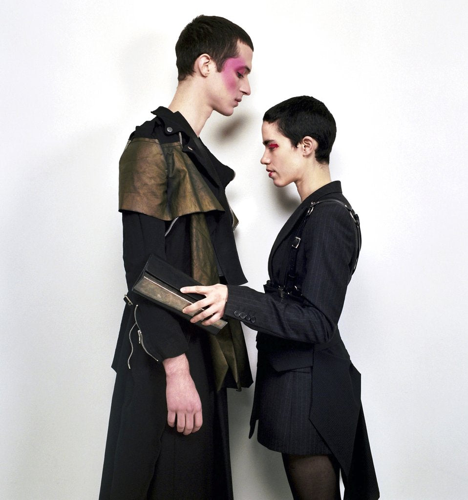 two models facing each other.