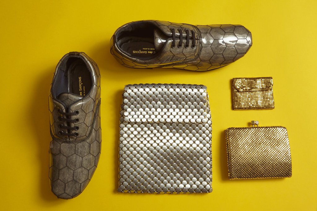 still life of sneakers and purses.