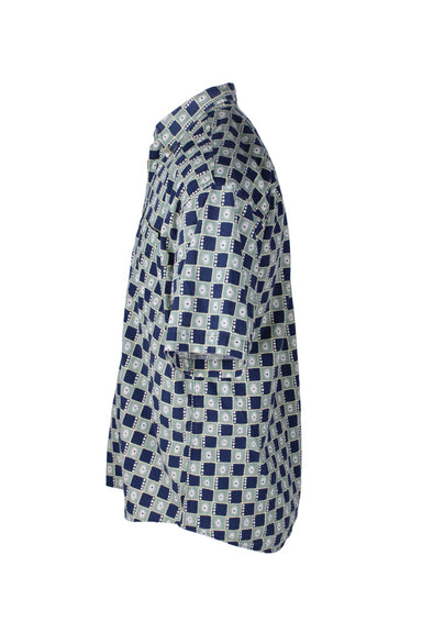 side angle vintage 90s shirt on masculine mannequin torso.