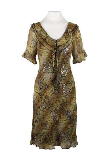 front of vintage lapis yellow short sleeves midi dress. features paisley print throughout with silver toned beads, v-neck, ruffled detail at neckline/sleeves, and black toned stitching at trim.