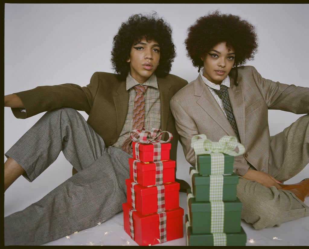 two models in suiting and presents. 