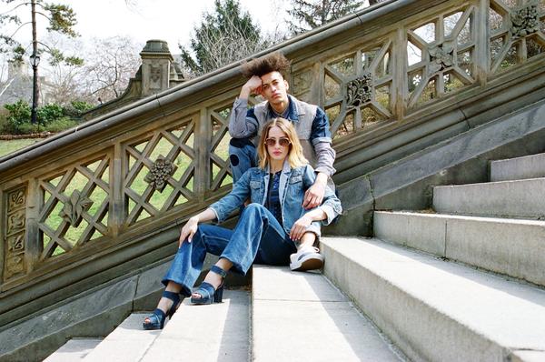 two models in all denim on steps at central park.