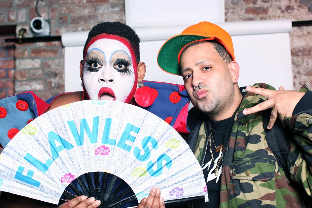 merrie cherry and horchata portrait with fan that reads 'flawless'.