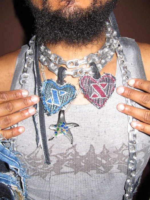 close up of denzel modeling his work