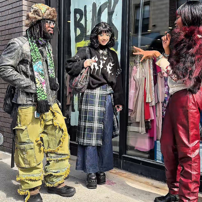 picture of gerald, peggy and odera all wearing really cool outfits