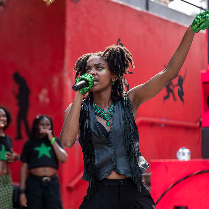 rocki ozai performing at pow fest