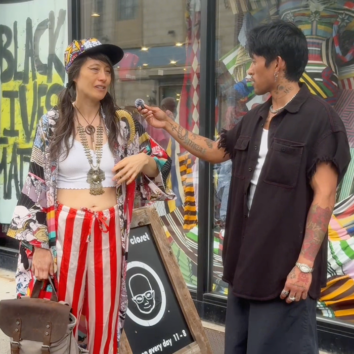 screenshot of beacons closet word on the street interview. Andre and Alycia standing in the front of the store.