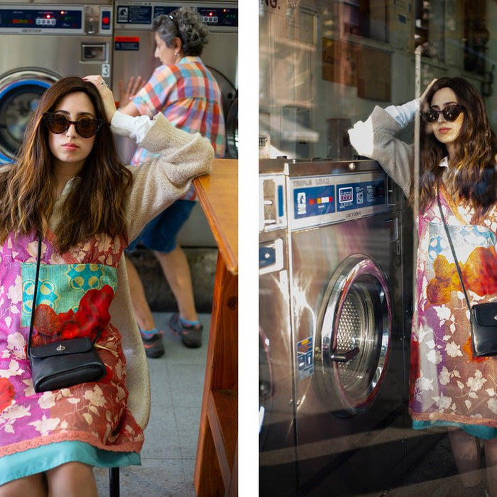 diptych of toiby in graphic dress and sunglasses sitting inside laundromat and toiby leaning against washing machine. 