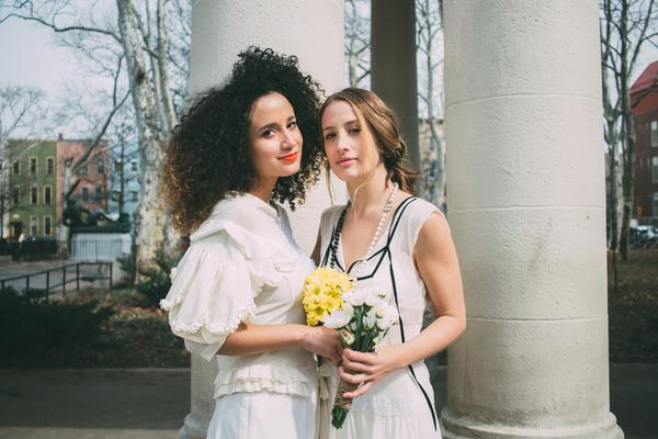 models portrait holding flowers. 