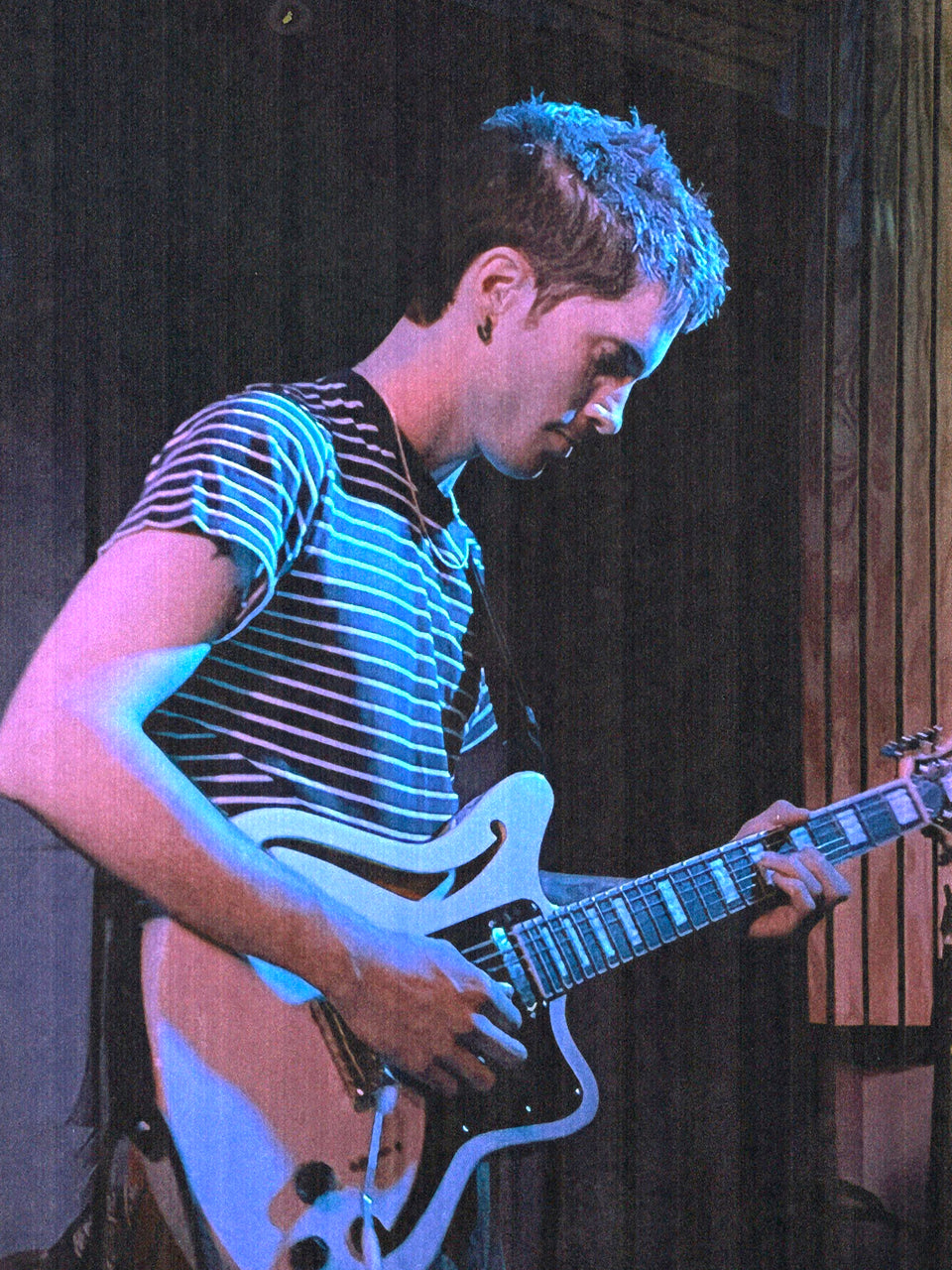 ok, tyler playing guitar in striped shirt.