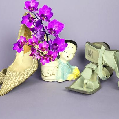 still life of dior pump heels and sandal heels. 