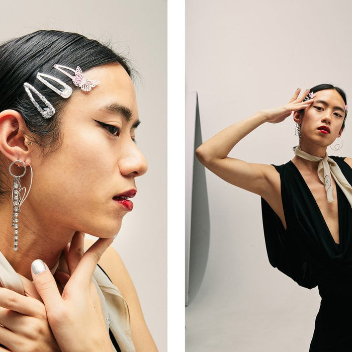 diptych yên profile portrait featuring earrings and barrettes and yên leaning against wall in draped dress.