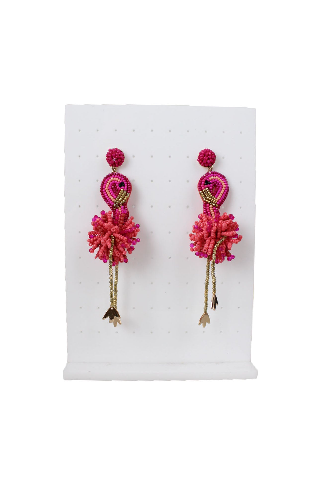 front angle of baublebar pink beaded flamingo earrings. 