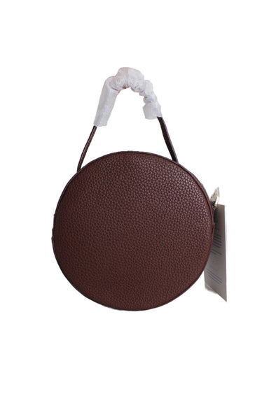 siizu brown crossbody bag/handbag featuring a round shape, gold tone hardware, removable should strap, tonal topstitching and a zip closure that opens to main compartment. 