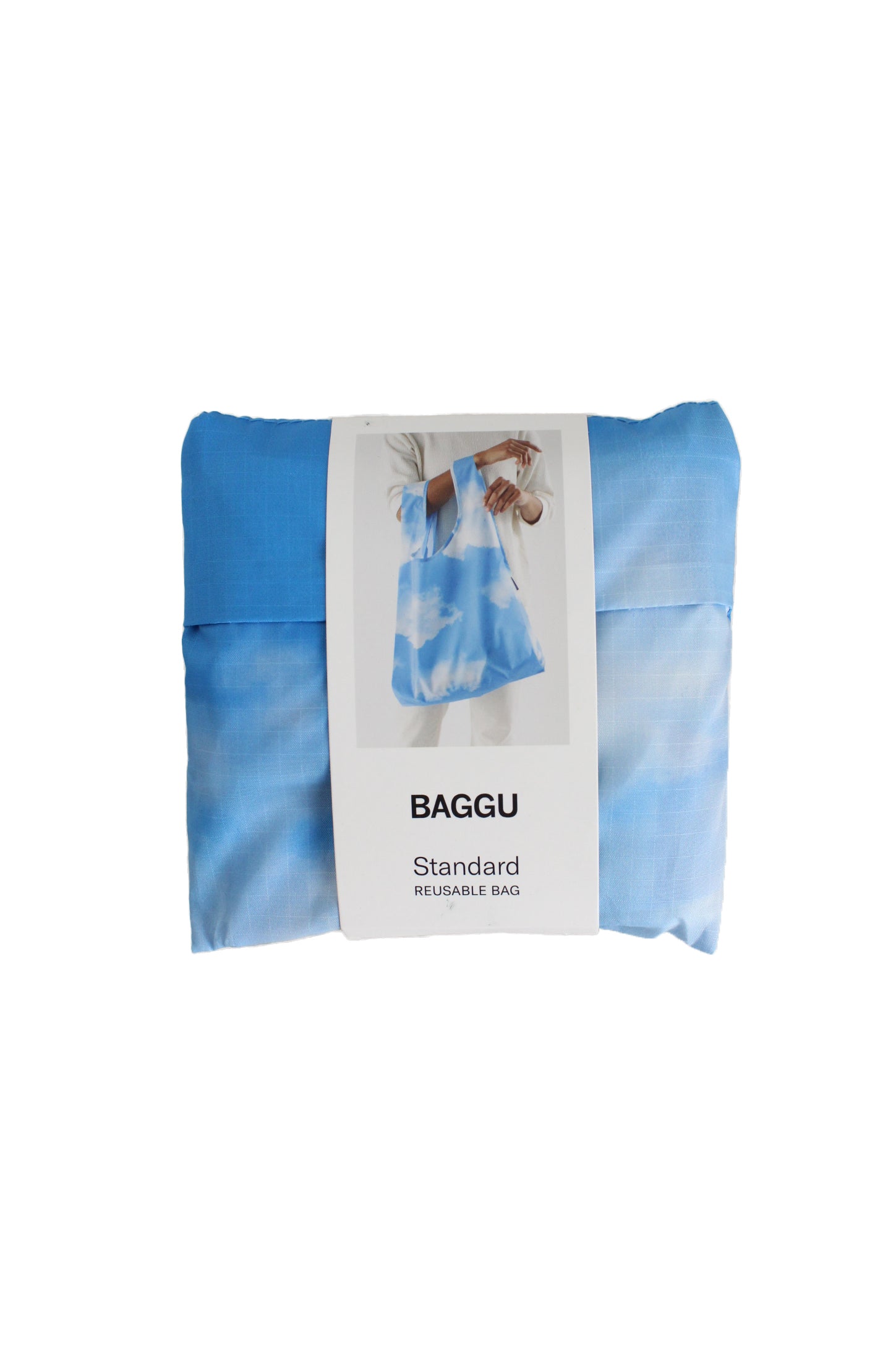 baggu blue reusable bag. features clouds print throughout, two straps, and embroidered logo tag.