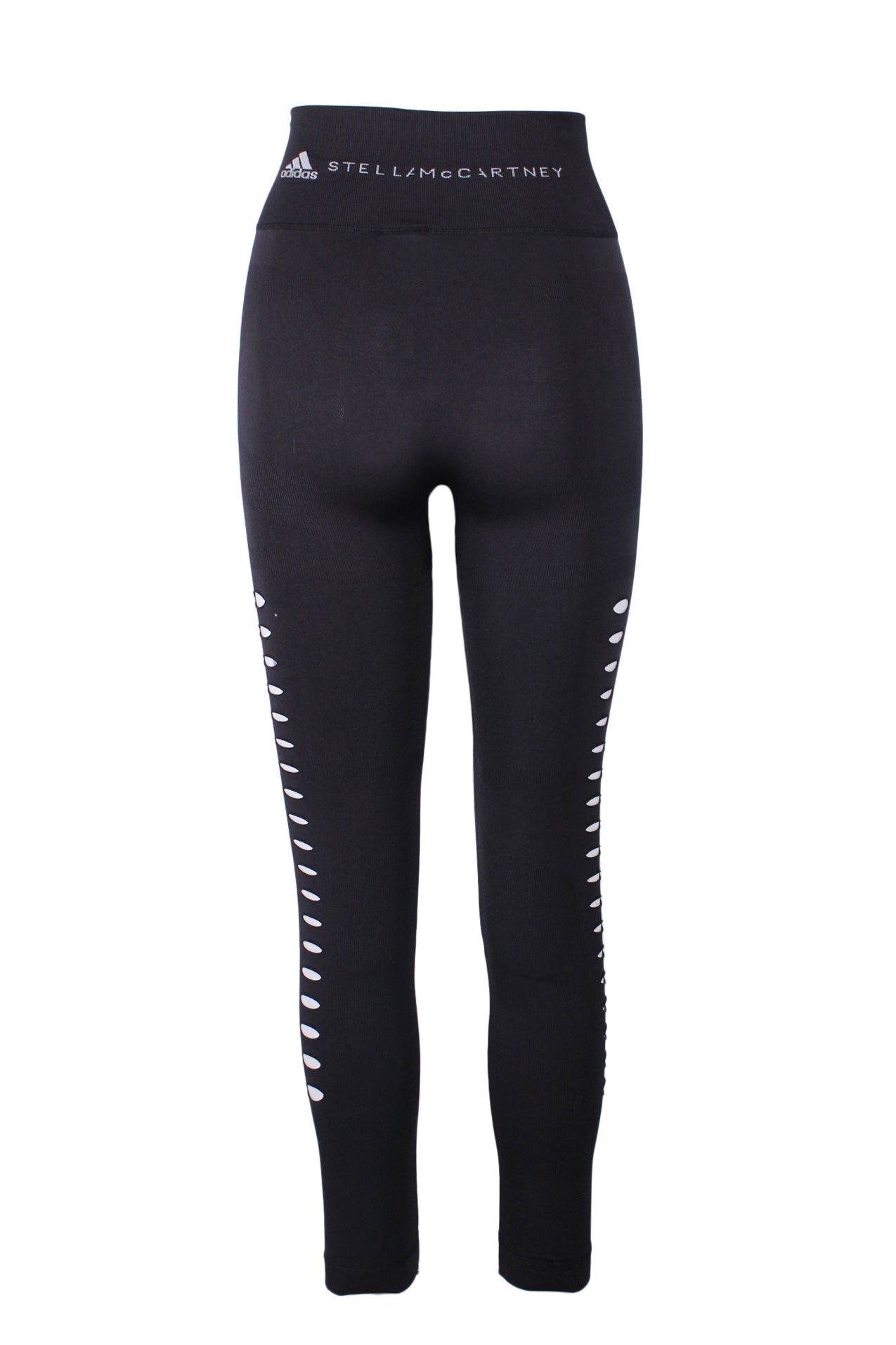 back angle of athletic leggings featuring  tear-shaped cutout side detail and contrast branding at back waistband. 