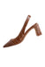 profile of vince camuto brown leather pump. features crocodile pattern throughout, pointed toe, slingback strap, extended heel with gold tone hardware, and slip on style.