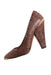 profile of zac posen brown leather pumps. features snakeskin pattern throughout, pointed toe, gold metal detail at toe/back ankle, and pull on style.