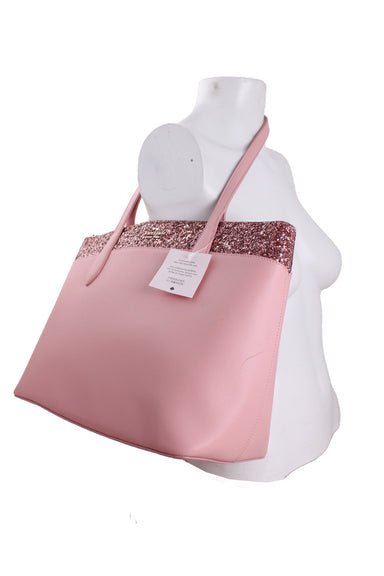 three-quarter angle with straps over mannequin torso.