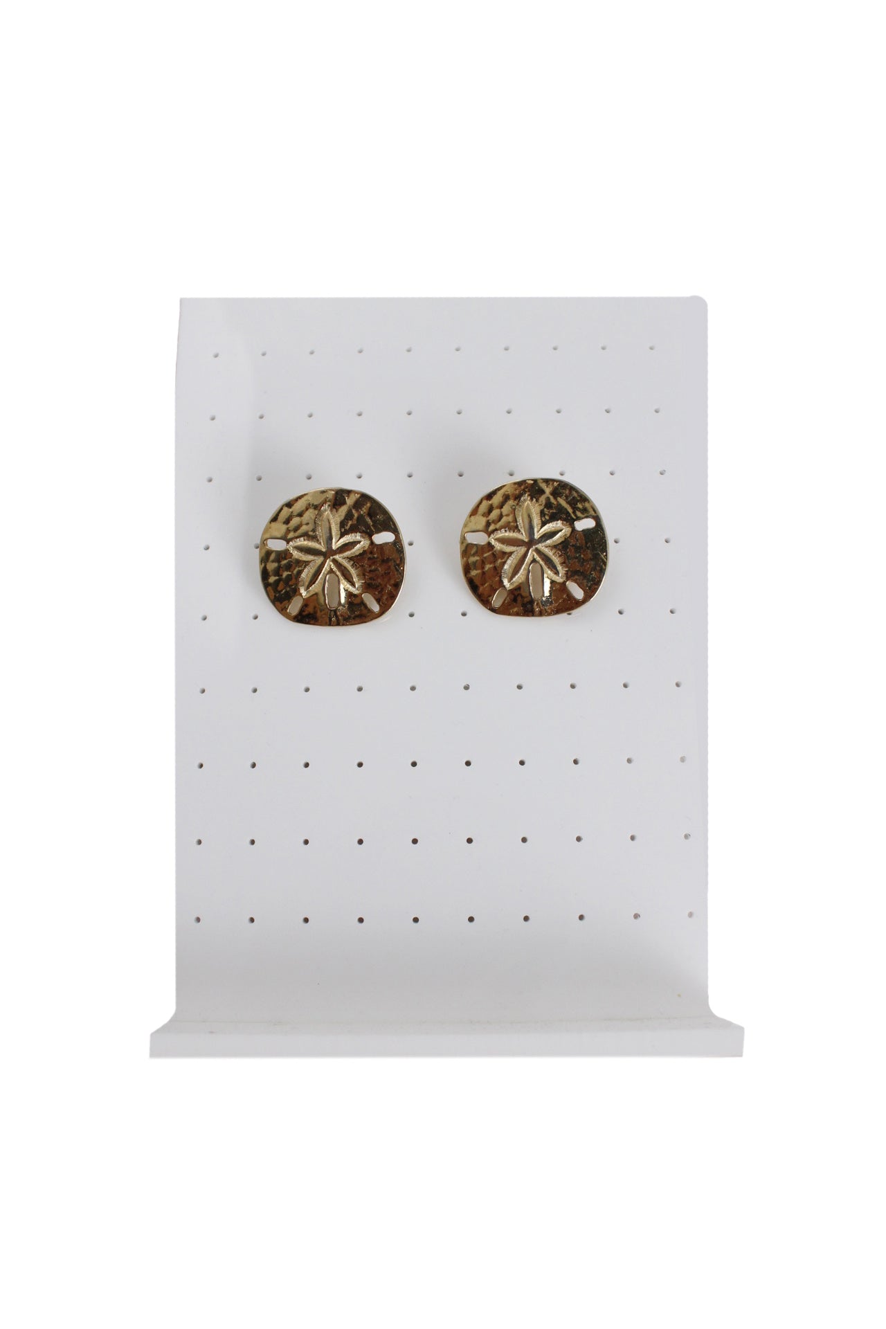 round gold toned metallic with a sand dollar-like center staged against an earring stand