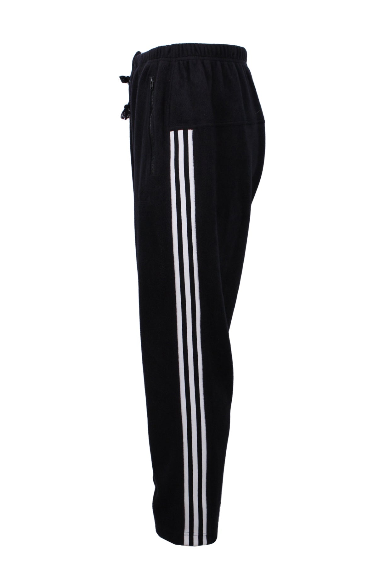 profile of pants displayed on half mannequin. classic adidas three white stripe detail running down side of leg. 