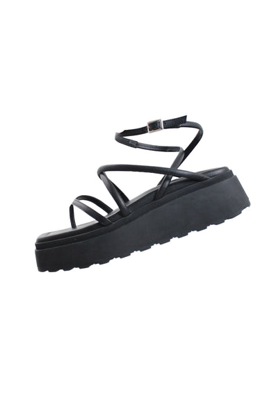 profile of vic matie black strap sandals. features strap design, ankle strap with buckle closure, square toe, platform measuring ~2". 