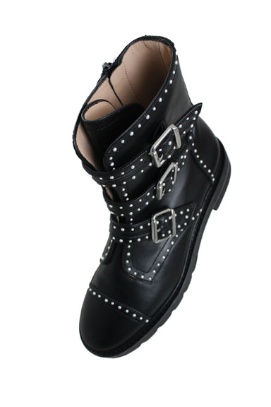upper angle of studded pearl boots. features inner ankle zipper. 
