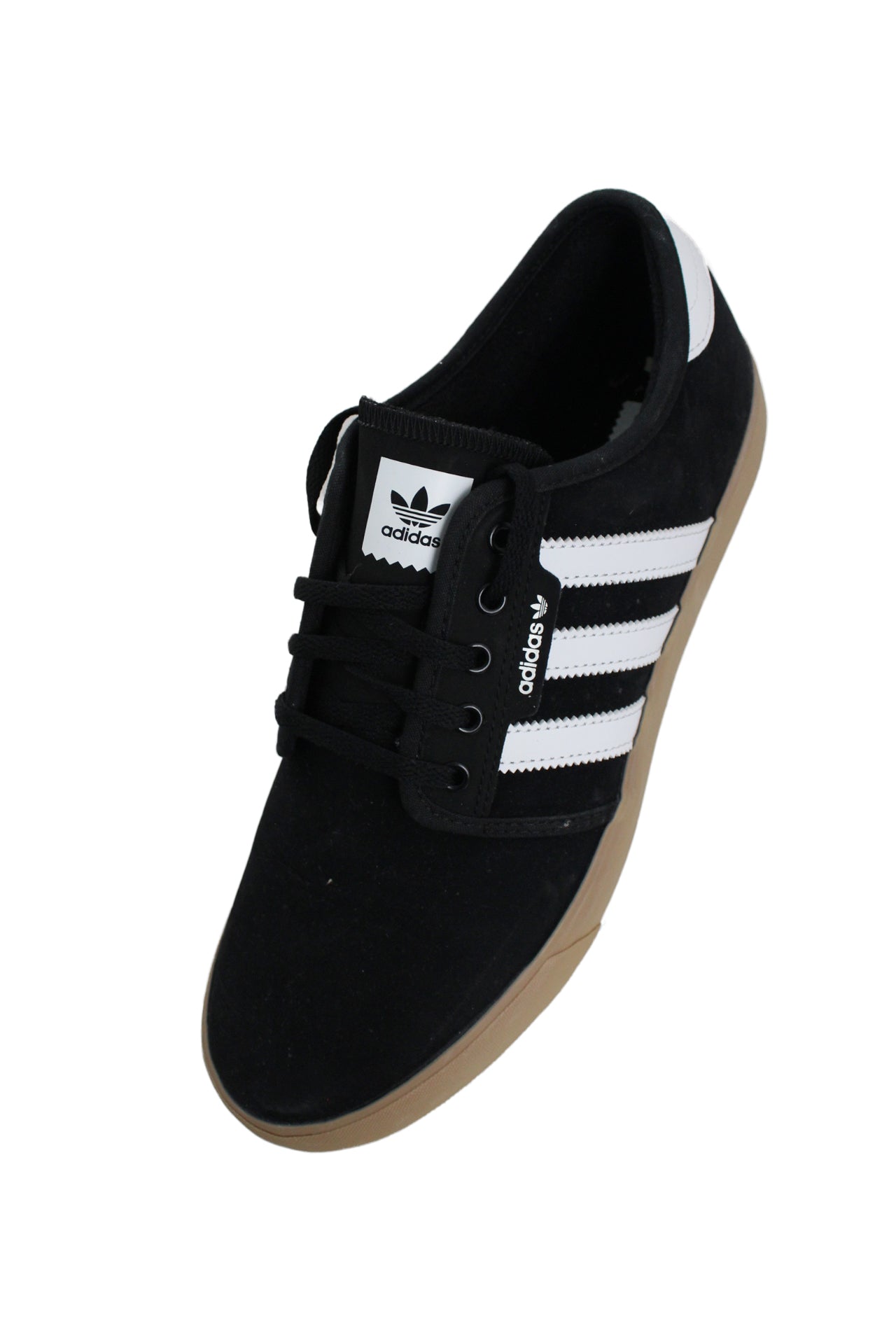 upper angle of adidas shoes. text 'adidas' on tongue and side wall. 