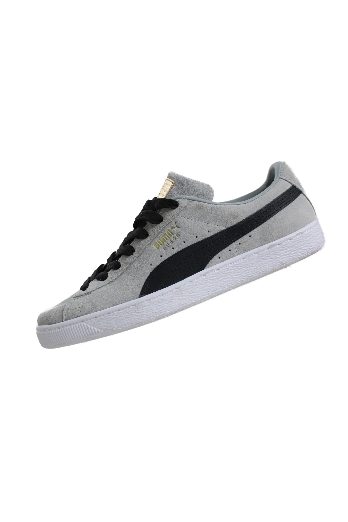 side angle of puma light grey/black/white suede shoes. features ‘puma’ logo tag at tongue, ‘puma suede’ logo at sides, ‘puma’ logo at heel, and top flat lace closure.  