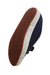 ¾ button view of navy sneakers showcasing contrasting brown textured soles