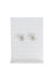 clear cut beaded floral clip-on earrings staged on earrings stand. 