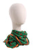 mannequin with green print scarf at neck featuring yellow and red fox/stripes prints throughout, square shape, and finished edges. 